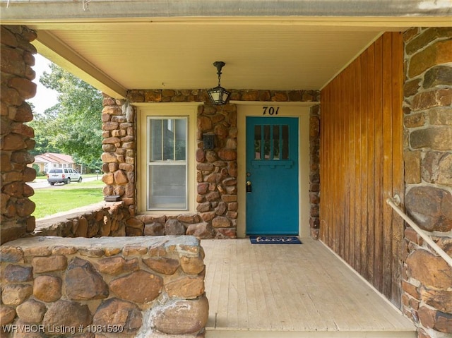 701 Witte St, Poteau, OK 74953 - view of exterior entry with a porch