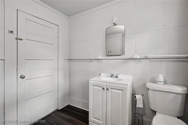 701 Witte St, Poteau, OK 74953 - bathroom featuring vanity, ornamental molding, and wood finished floors