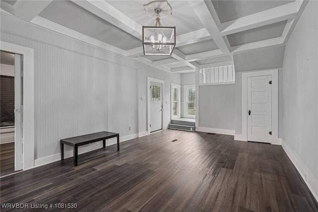 701 Witte St, Poteau, OK 74953 - empty room featuring a chandelier, dark wood finished floors, beam ceiling, and coffered ceiling