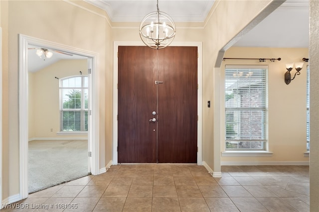 2117 Parkway Cir, Van Buren, AR 72956 - entrance foyer with a chandelier, tile patterned flooring, crown molding, and baseboards