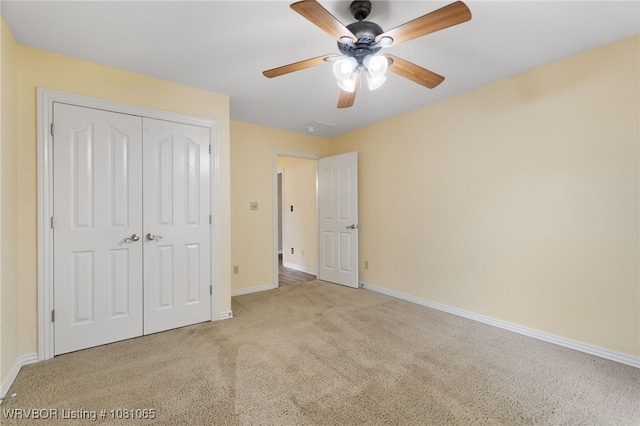 2117 Parkway Cir, Van Buren, AR 72956 - unfurnished bedroom with baseboards, carpet, a closet, and a ceiling fan