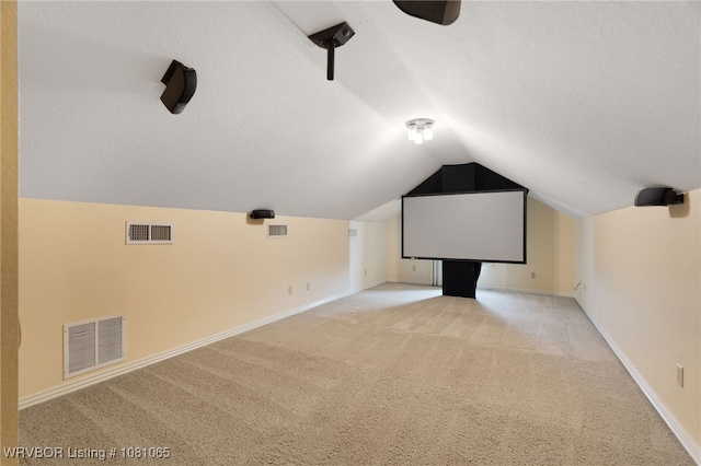 2117 Parkway Cir, Van Buren, AR 72956 - home theater room featuring carpet floors, vaulted ceiling, and baseboards