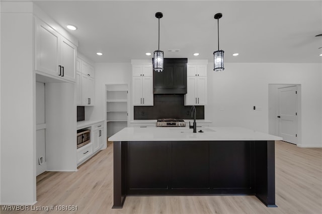 9009 Carson Way, Fort Smith, AR 72908 - kitchen with recessed lighting, a sink, light wood-type flooring, light countertops, and white cabinetry