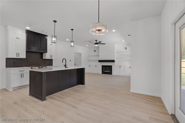 9009 Carson Way, Fort Smith, AR 72908 - kitchen featuring ceiling fan, recessed lighting, white cabinetry, light wood-style flooring, and light countertops