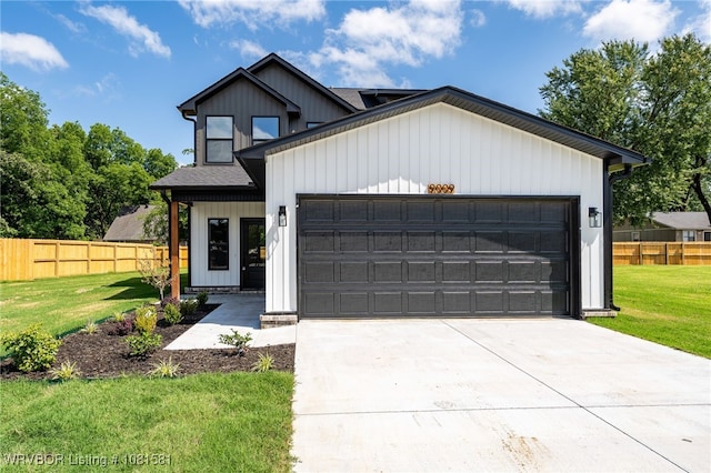 9009 Carson Way, Fort Smith, AR 72908 - modern farmhouse with board and batten siding, a garage, and driveway