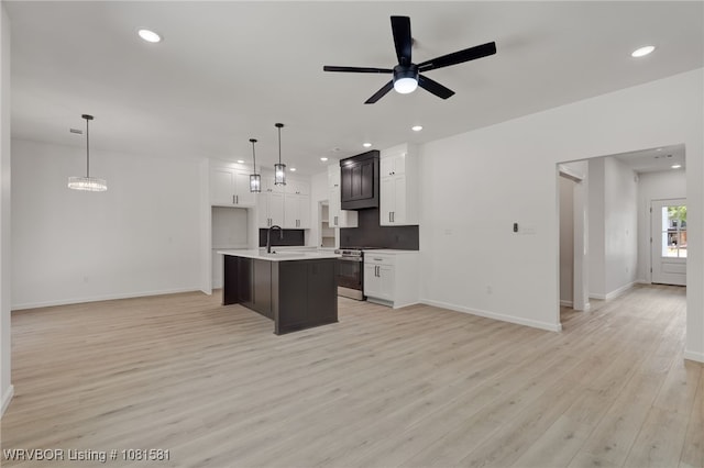 9009 Carson Way, Fort Smith, AR 72908 - kitchen with open floor plan, stainless steel range with gas cooktop, light countertops, baseboards, and recessed lighting