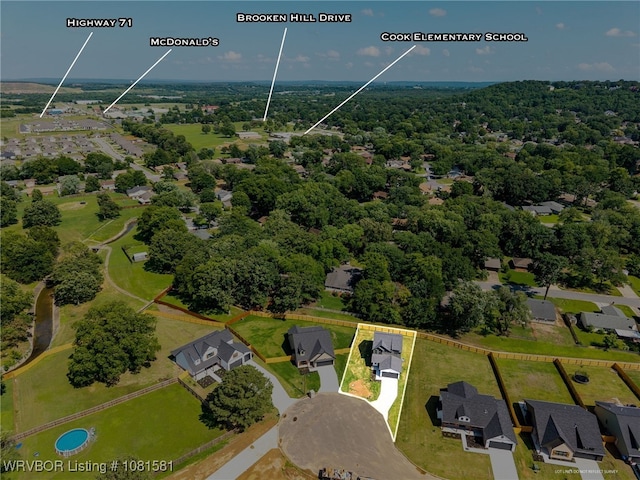 9009 Carson Way, Fort Smith, AR 72908 - aerial perspective of suburban area with a forest and property parcel outlined