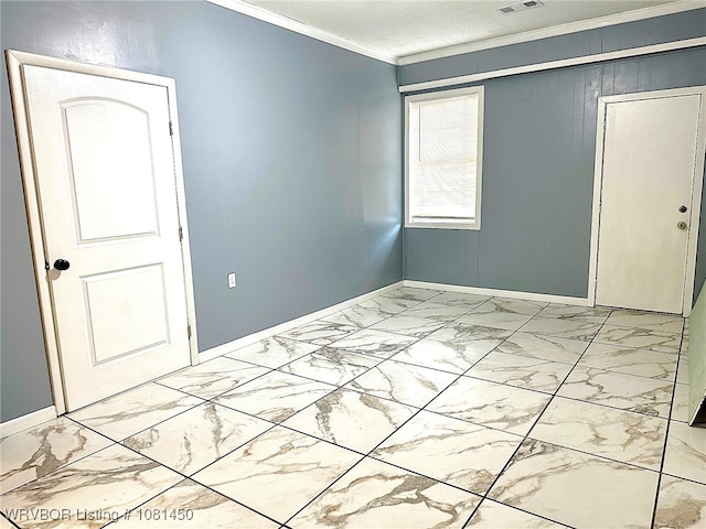 1800 N 45th Ter, Fort Smith, AR 72904 - spare room featuring baseboards, crown molding, and light marble finish flooring