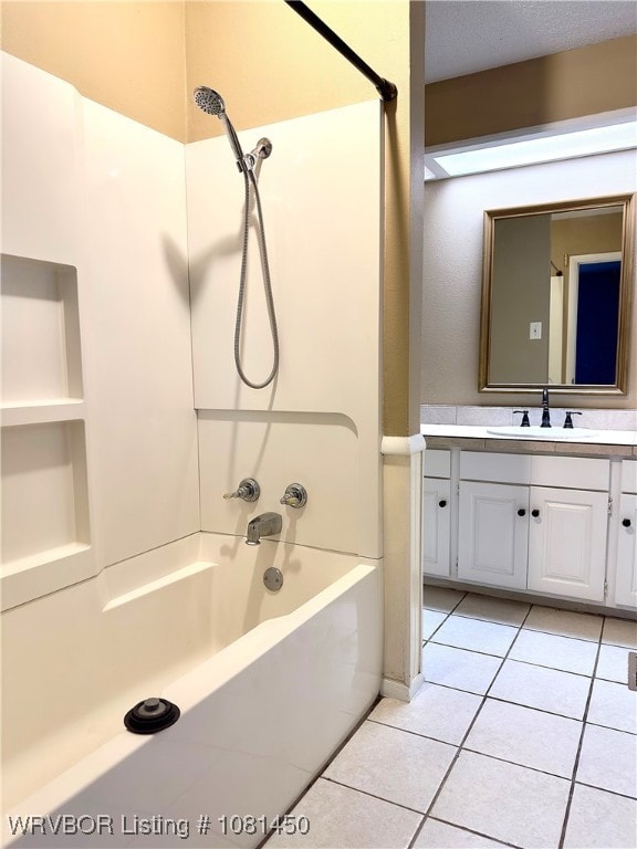 1800 N 45th Ter, Fort Smith, AR 72904 - bathroom featuring tile patterned flooring, vanity, and washtub / shower combination