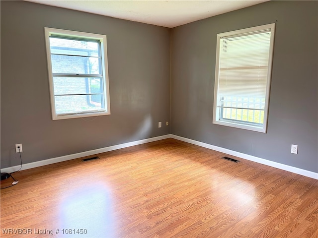 1800 N 45th Ter, Fort Smith, AR 72904 - spare room with wood finished floors and baseboards