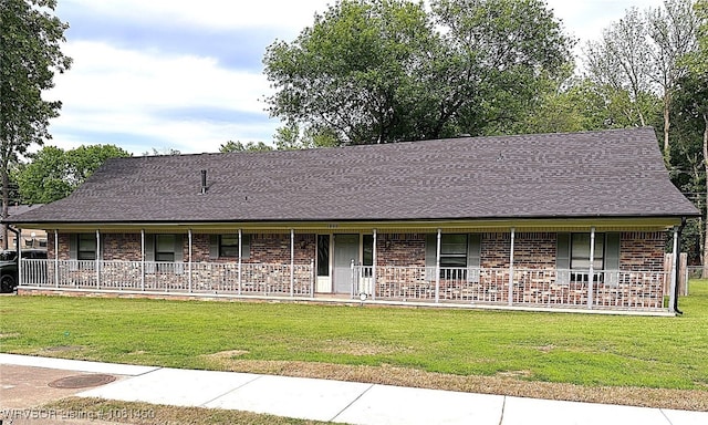 1800 N 45th Ter, Fort Smith, AR 72904 - view of front of home featuring a porch, brick siding, and a front lawn