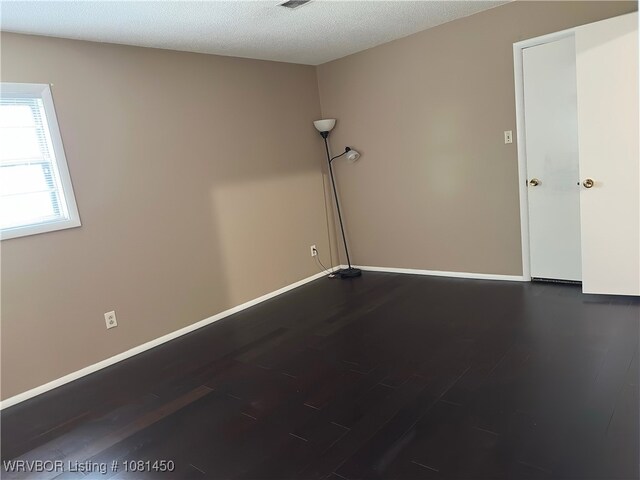 1800 N 45th Ter, Fort Smith, AR 72904 - unfurnished room with wood finished floors and baseboards