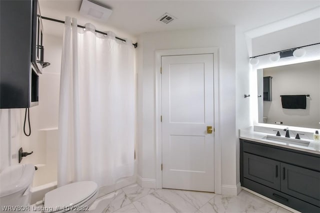 full bathroom with shower / bath combo with shower curtain, vanity, and toilet