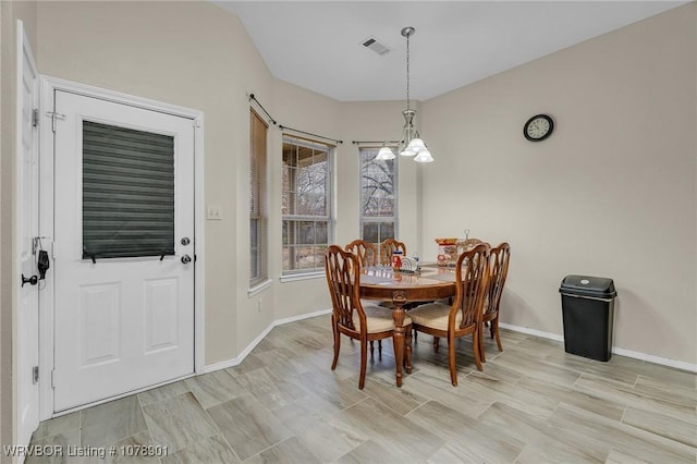 dining room with light hardwood / wood-style floors