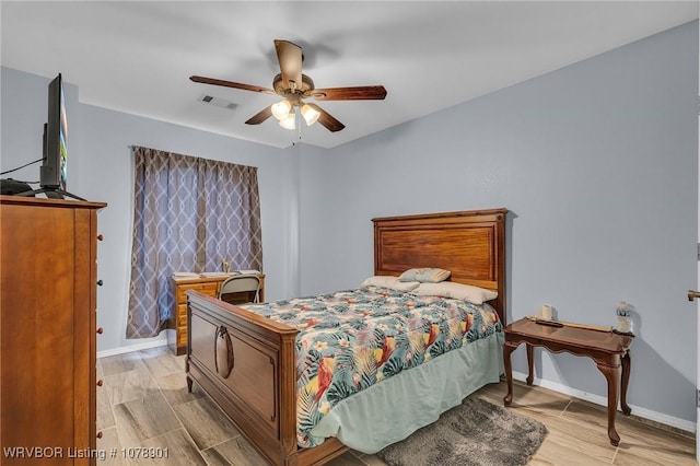 bedroom featuring ceiling fan and light wood-type flooring