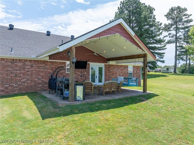 1205 S Division St, Lavaca, AR 72941 - rear view of property with french doors, a patio area, a yard, and brick siding