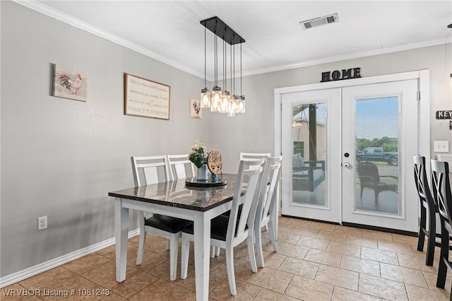 1205 S Division St, Lavaca, AR 72941 - dining room featuring ornamental molding, french doors, and baseboards