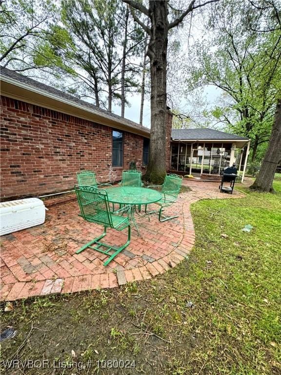 9704 Apple Gate Dr, Fort Smith, AR 72903 - view of patio / terrace featuring a sunroom