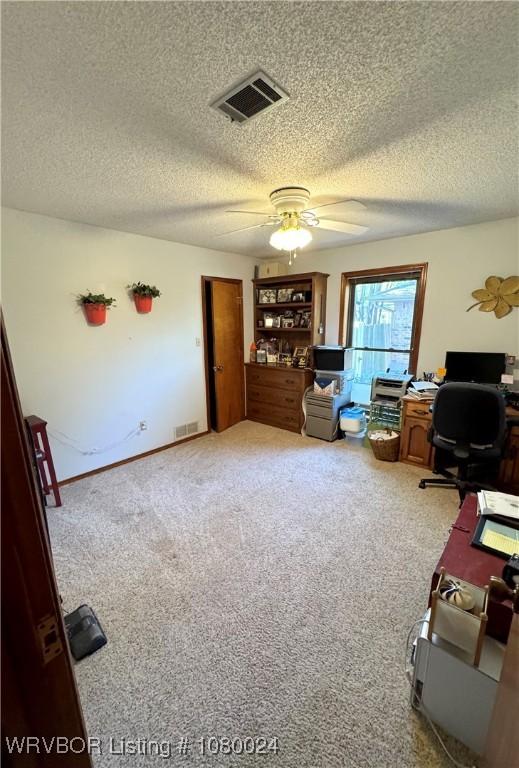 9704 Apple Gate Dr, Fort Smith, AR 72903 - office space featuring visible vents, a textured ceiling, and a ceiling fan
