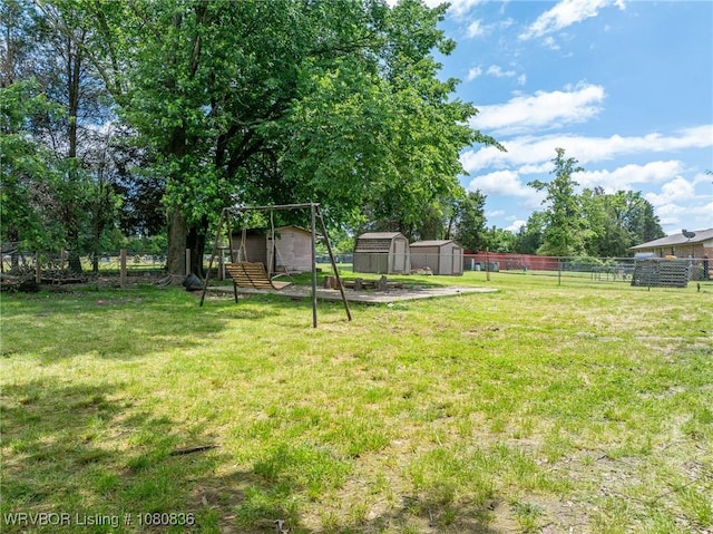 view of yard with a shed and an outdoor structure