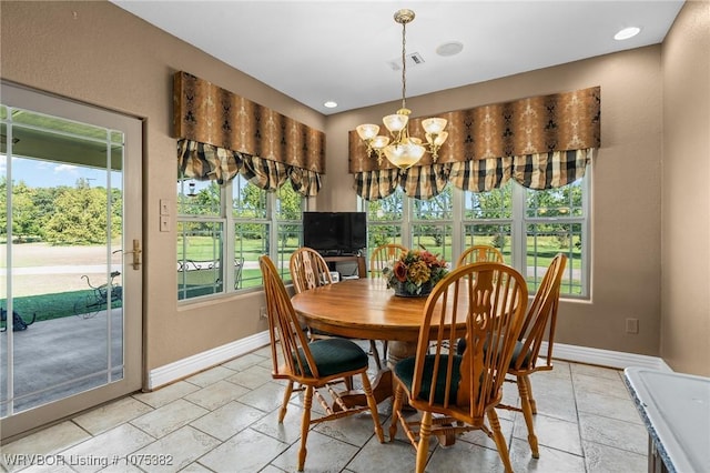 dining room with an inviting chandelier, visible vents, baseboards, and recessed lighting