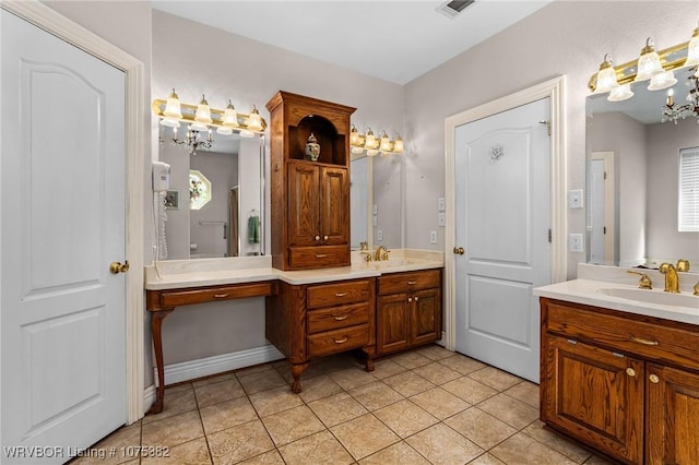 full bath with a chandelier, visible vents, tile patterned flooring, and vanity