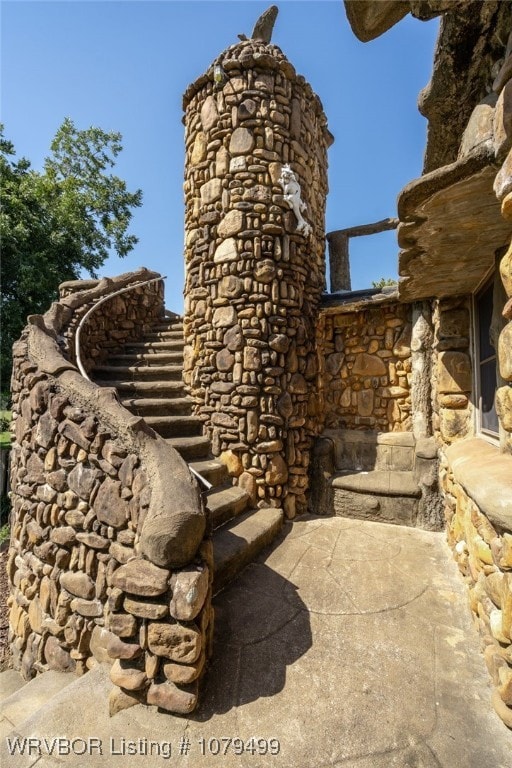 exterior details with stone siding