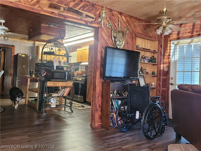 living room featuring hardwood / wood-style floors, ceiling fan, wooden ceiling, and wood walls