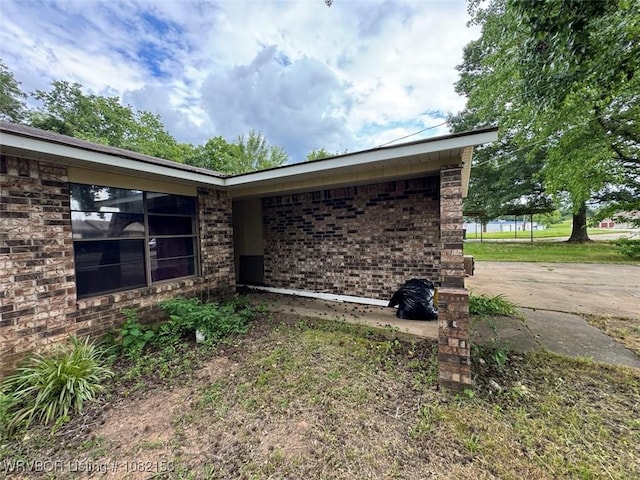 412 7th St, Barling, AR 72923 - view of home's exterior featuring brick siding