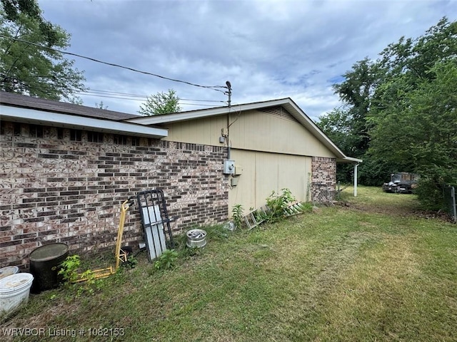 412 7th St, Barling, AR 72923 - view of home's exterior with a lawn
