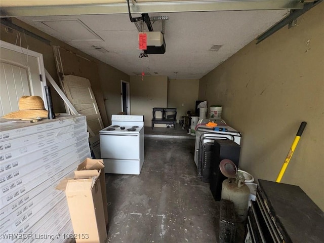 412 7th St, Barling, AR 72923 - garage featuring washer / clothes dryer and a garage door opener