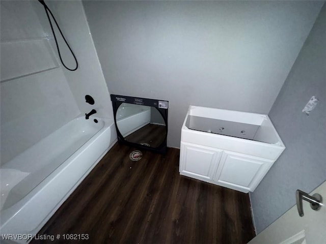 412 7th St, Barling, AR 72923 - full bathroom with wood finished floors and tub / shower combination