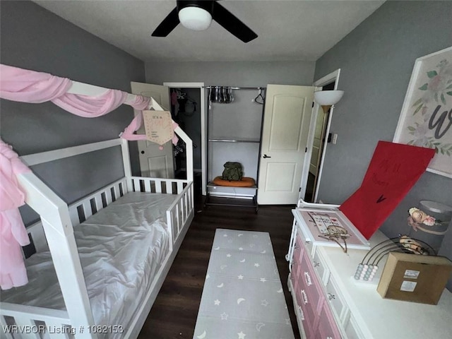 412 7th St, Barling, AR 72923 - bedroom with wood finished floors and a ceiling fan