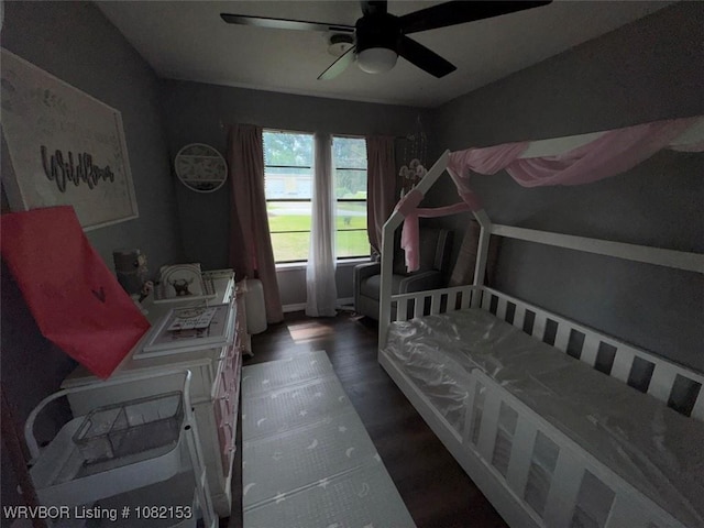 412 7th St, Barling, AR 72923 - bedroom featuring wood finished floors and a ceiling fan