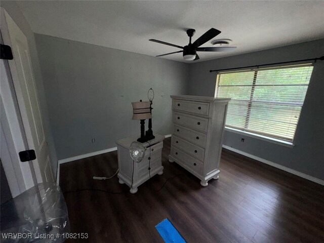 412 7th St, Barling, AR 72923 - bedroom featuring dark wood-type flooring and a ceiling fan