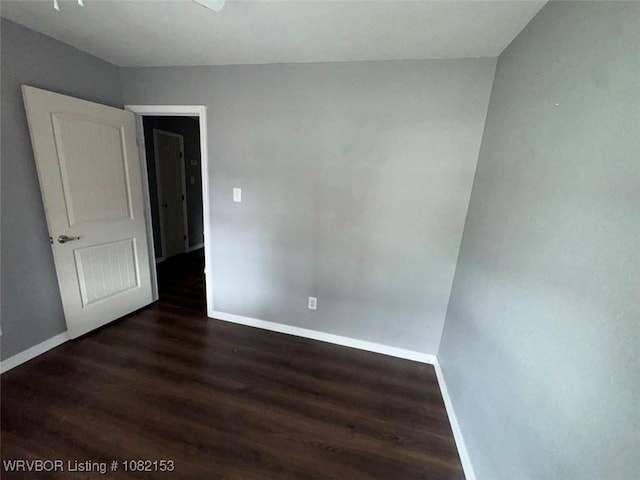 412 7th St, Barling, AR 72923 - unfurnished room with baseboards and wood finished floors