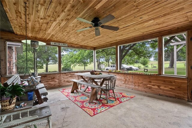 2650 Spielerville Rd, Paris, AR 72855 - sunroom with ceiling fan, plenty of natural light, and outdoor dining area