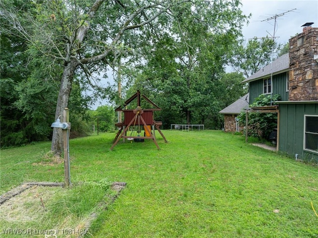 2650 Spielerville Rd, Paris, AR 72855 - view of green lawn featuring a playground
