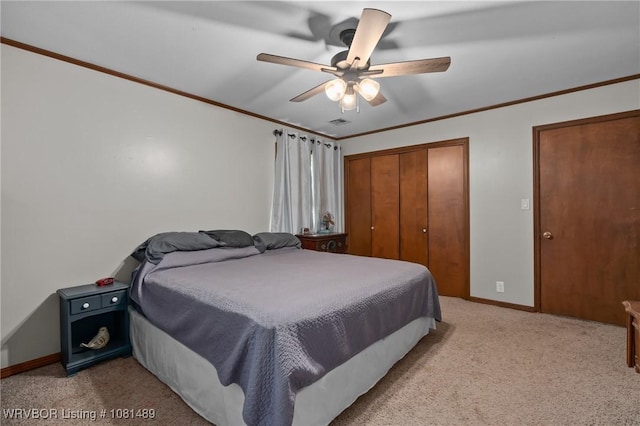 2650 Spielerville Rd, Paris, AR 72855 - bedroom featuring light colored carpet, ornamental molding, baseboards, a closet, and ceiling fan