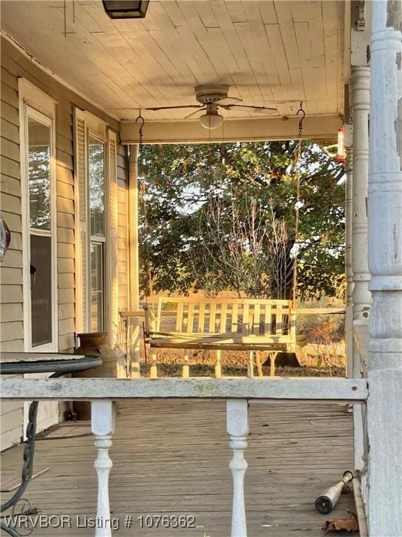 exterior details featuring ceiling fan