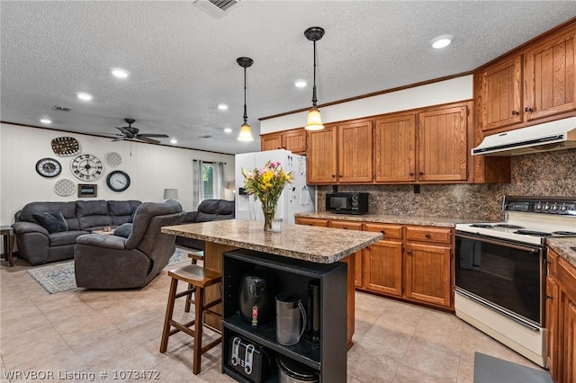 kitchen with decorative backsplash, white appliances, ceiling fan, crown molding, and pendant lighting