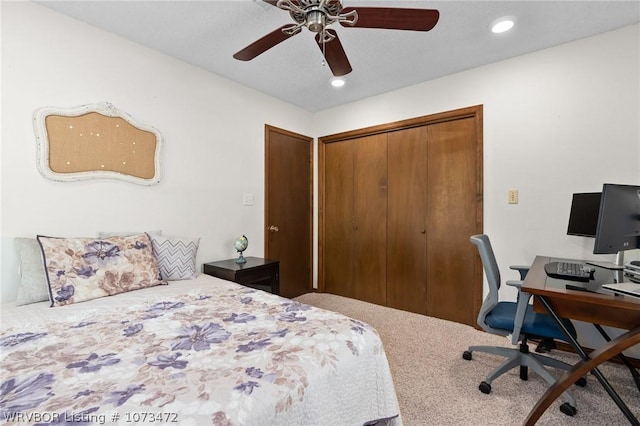 bedroom featuring carpet flooring, ceiling fan, and a closet