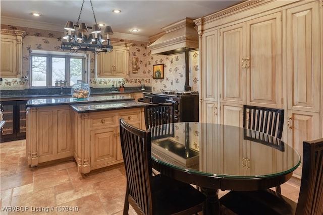 kitchen featuring wallpapered walls, crown molding, custom range hood, and a kitchen island