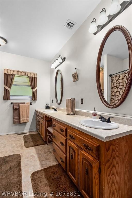 bathroom featuring vanity