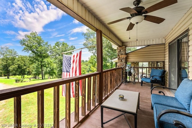 balcony with ceiling fan and covered porch