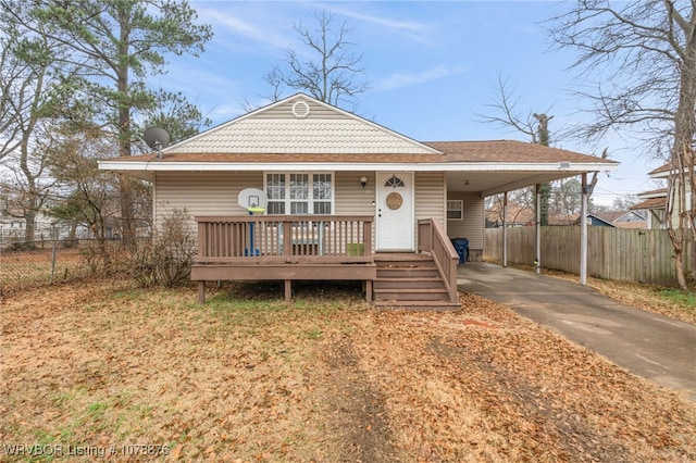 view of front of property with a carport