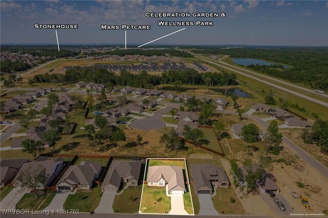8323 Mclaren Dr, Fort Smith, AR 72916 - aerial perspective of suburban area featuring property parcel outlined and a large body of water