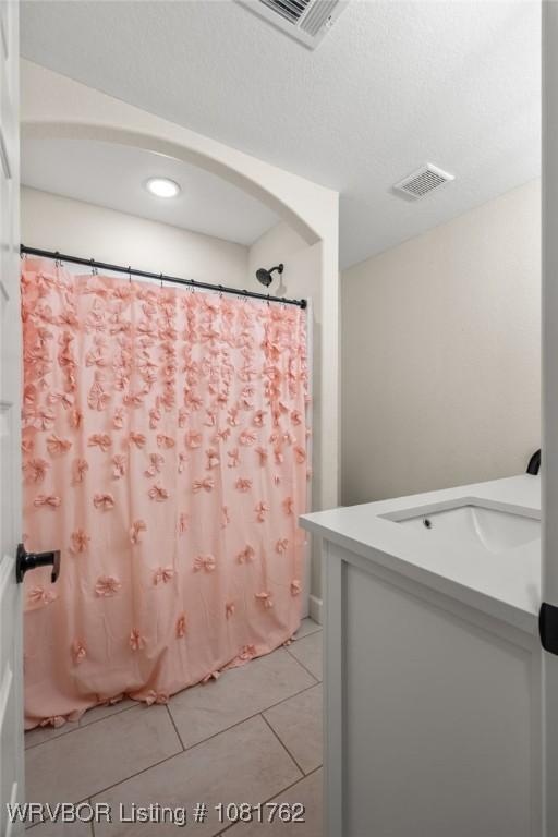 8323 Mclaren Dr, Fort Smith, AR 72916 - bathroom with vanity, tile patterned floors, a shower with curtain, and recessed lighting