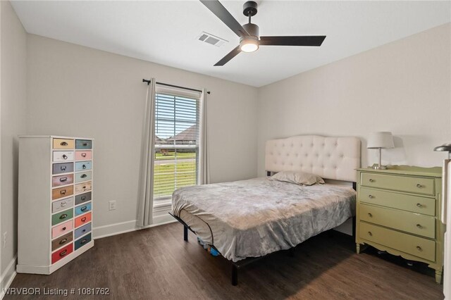 8323 Mclaren Dr, Fort Smith, AR 72916 - bedroom with dark wood-style flooring and a ceiling fan
