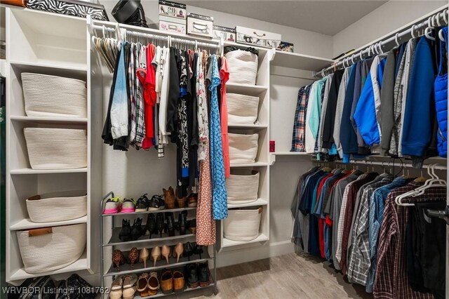 8323 Mclaren Dr, Fort Smith, AR 72916 - spacious closet with wood finished floors